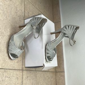 Heals, fancy, comfy, elegant.